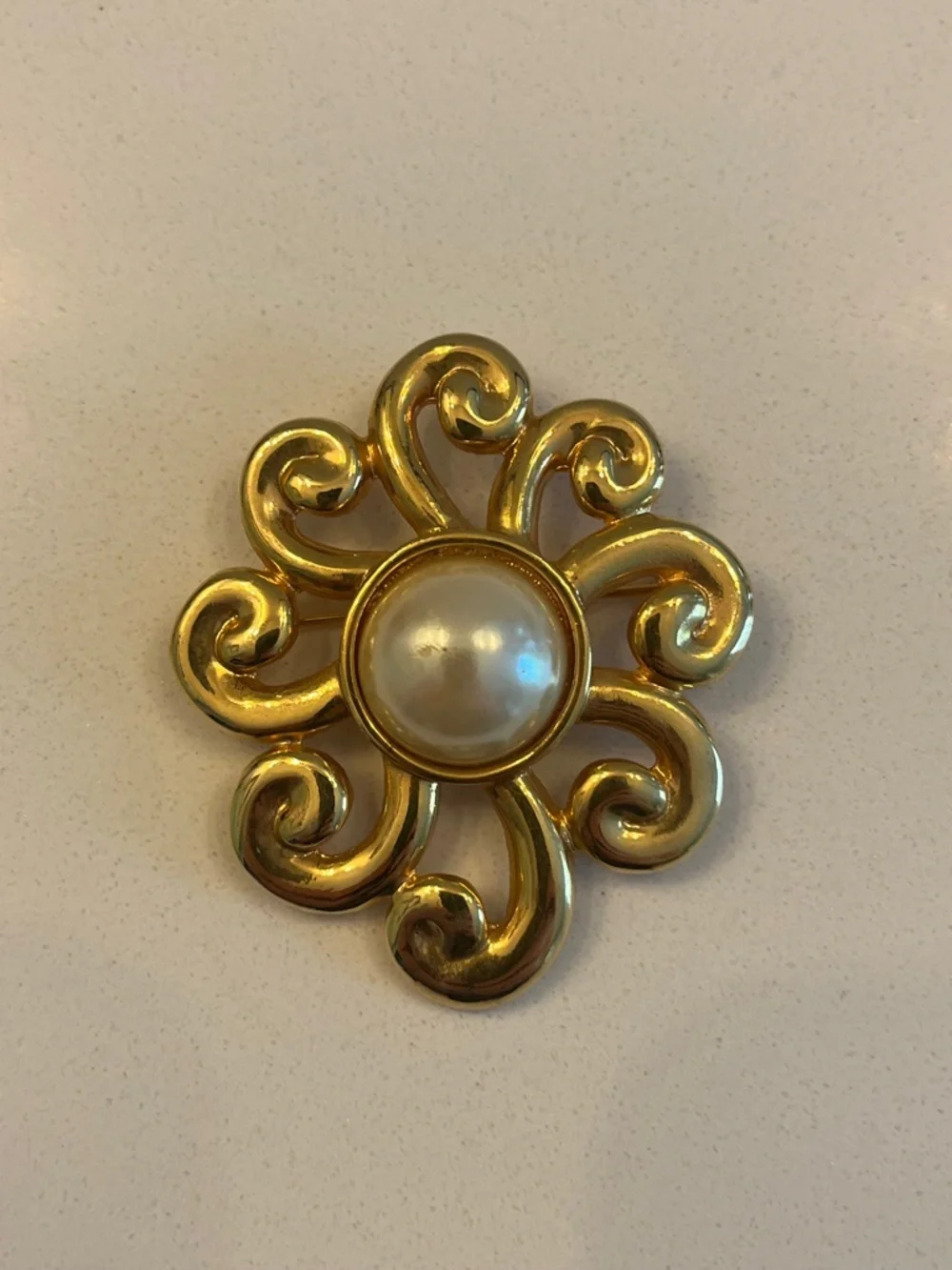Gold Tone Swirl Brooch with Center faux Pearl